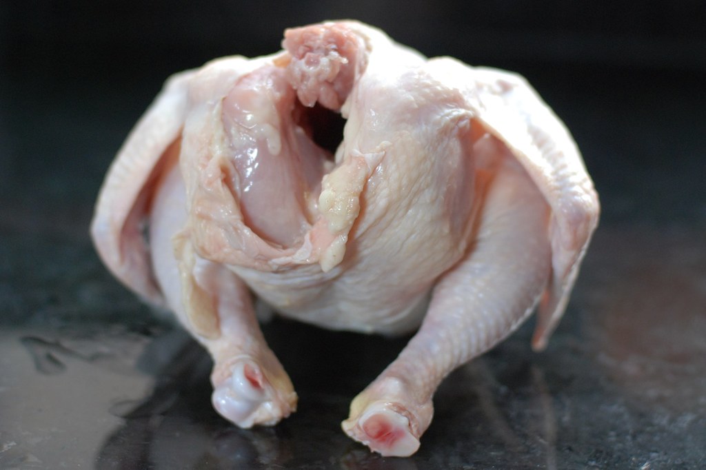 What are the benefits of boiling a whole chicken?